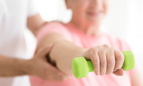 elderly lady doing physical therapy