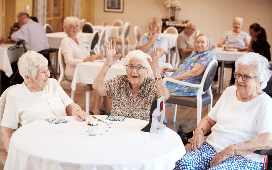 Seniors playing bingo having fun