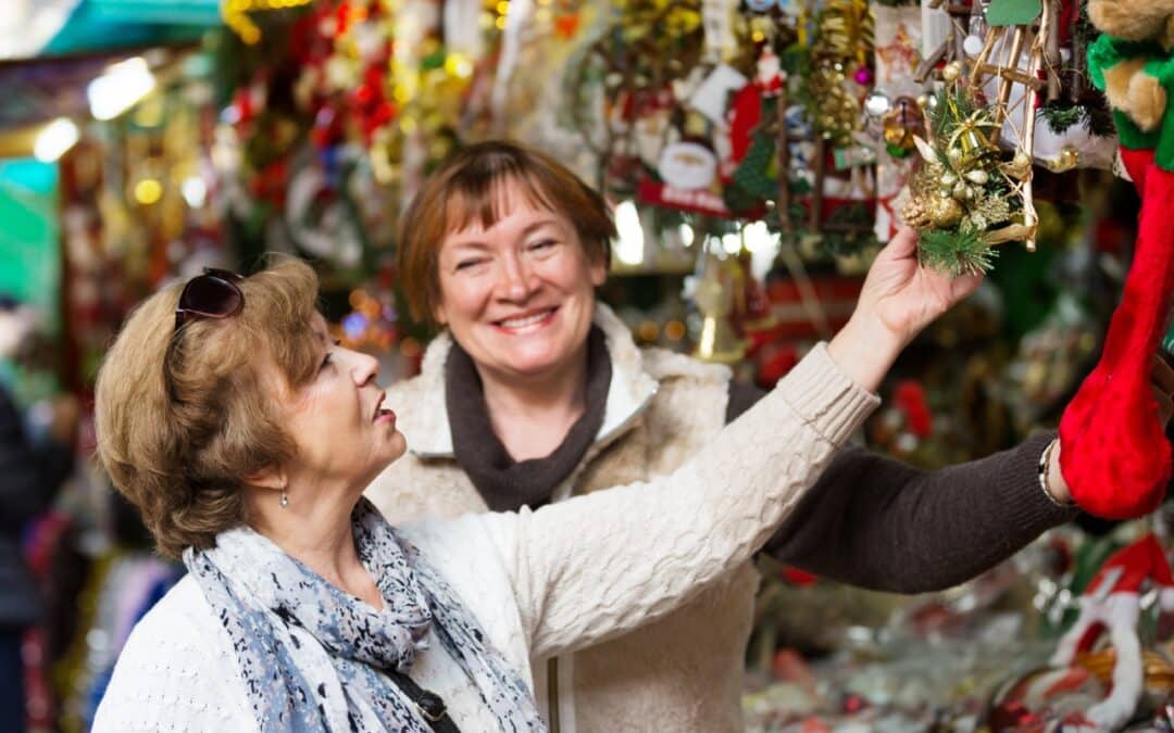 Two seniors shopping for Christmas decorations together